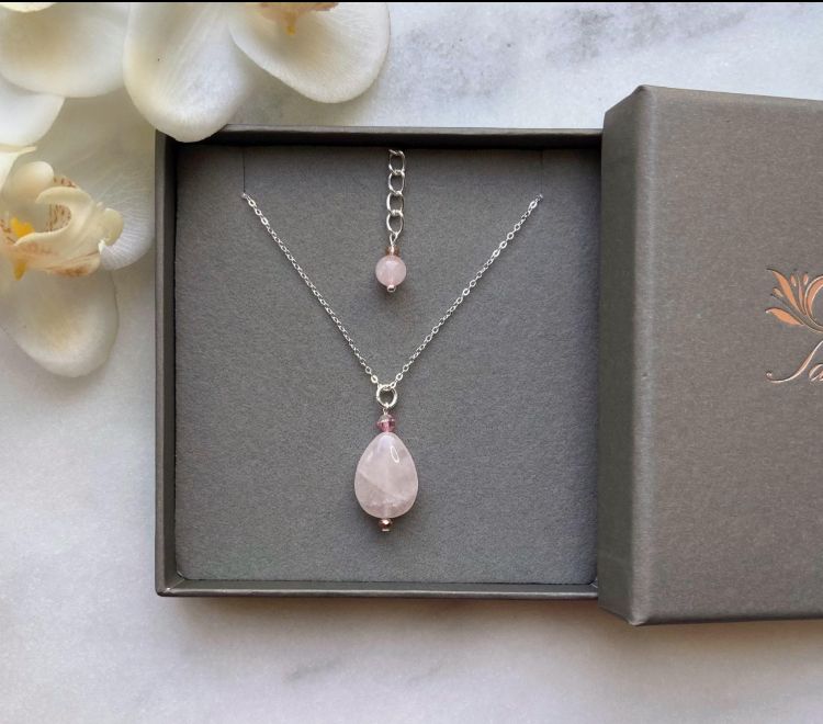 Rose quartz pendant necklace and matching earrings in a gift box