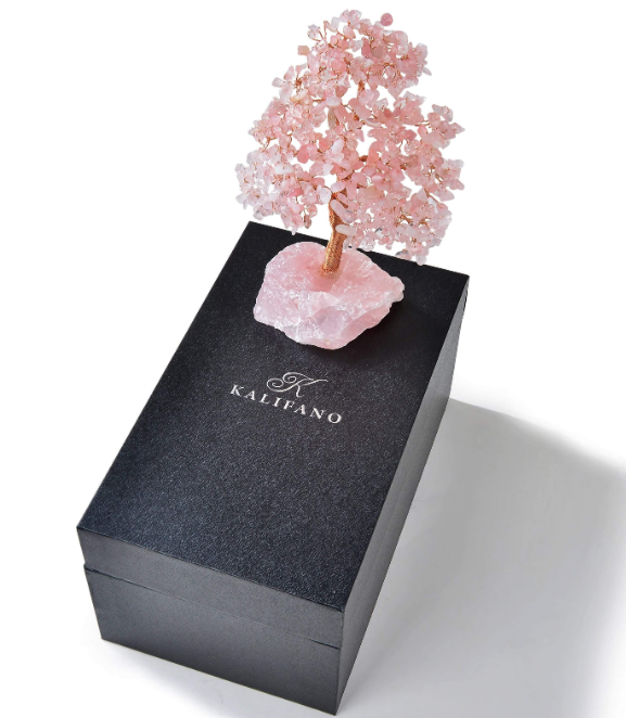Rose quartz crystal tree with pink gemstone leaves on a premium base