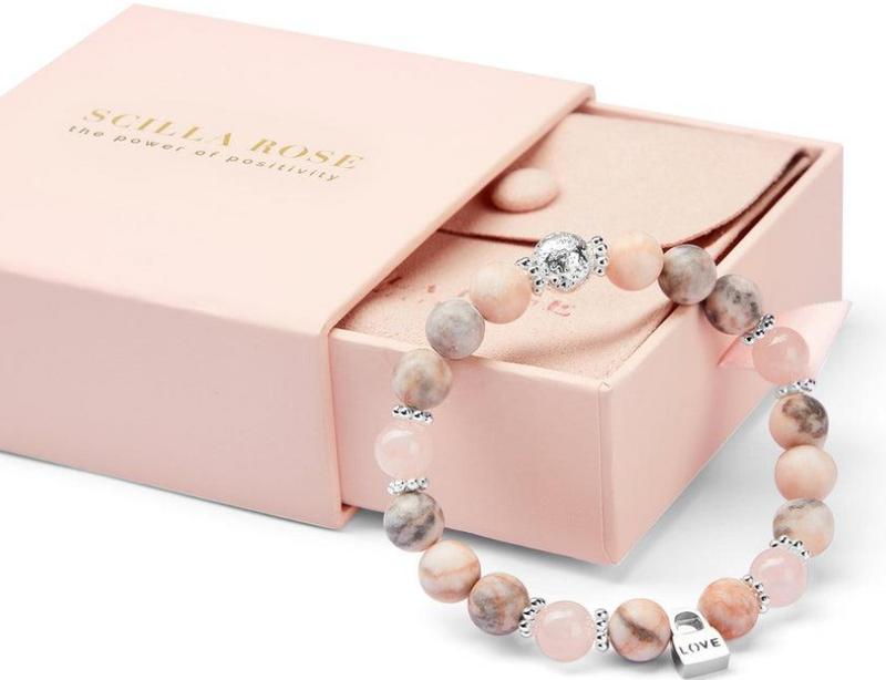 Rose quartz gemstone bracelet with love charm in pink gift box